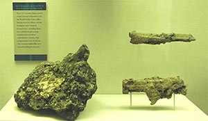 Click to view guns encased incased in concrete thumb