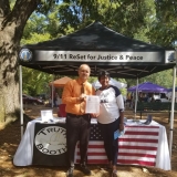 9/11 Truth Action Project Booth at WellsFest2019